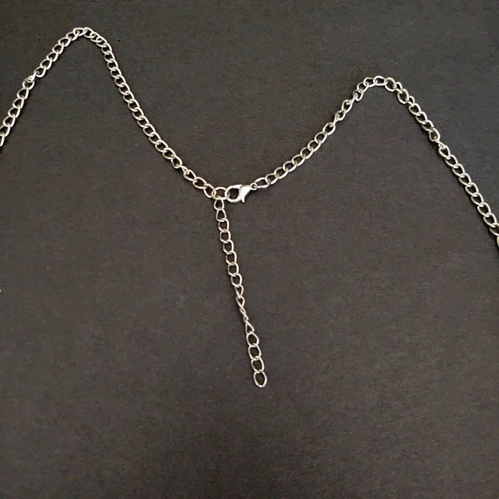 Long silver chain necklace with pink beads